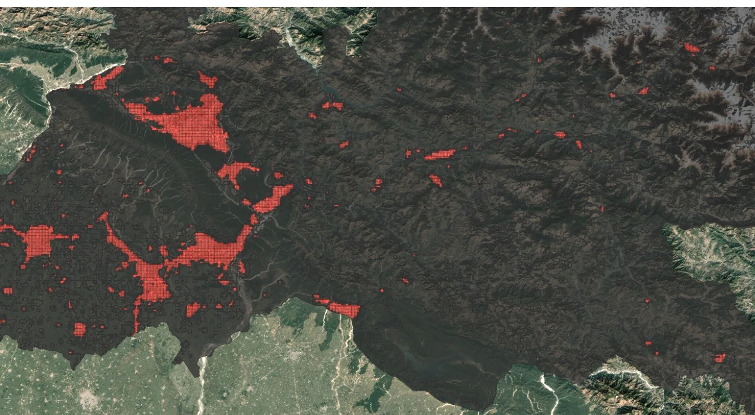 Night-time lights across Uttarakhand in 2025, shown in red against the district boundary